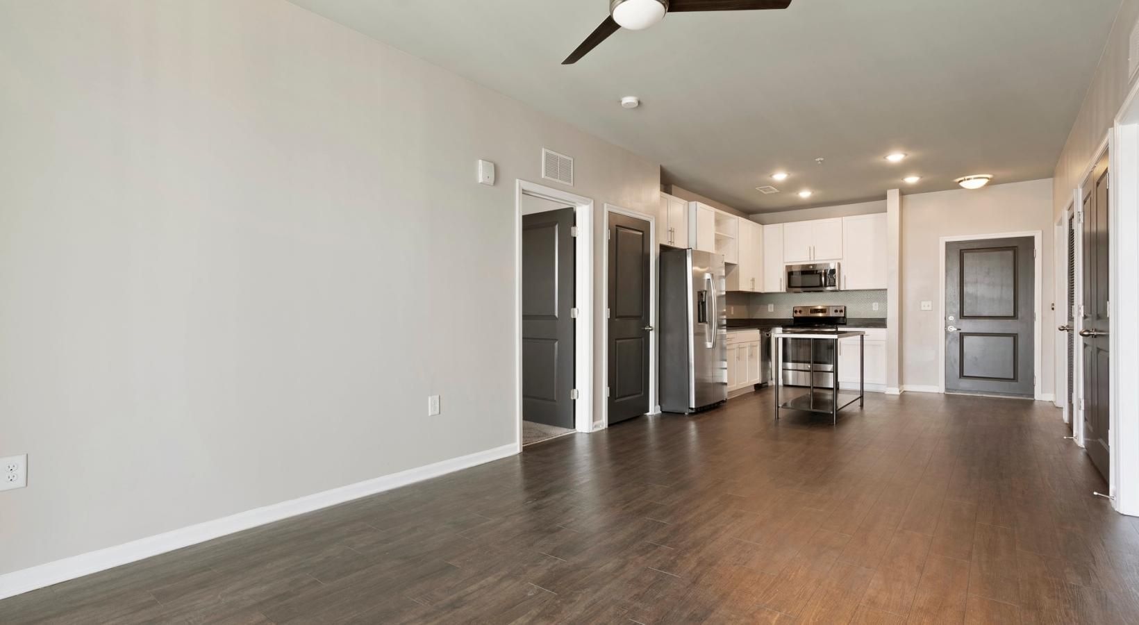 Generous living spaces to relax and unwind a large kitchen with a wood floor