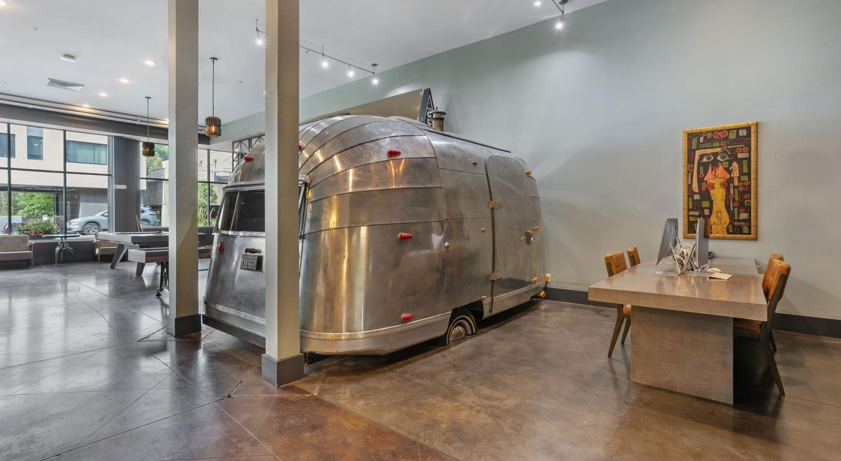 Settle into comfort at The Cleo a large metal tank in a room