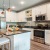 a kitchen with white cabinets