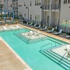 pool with lounge chairs