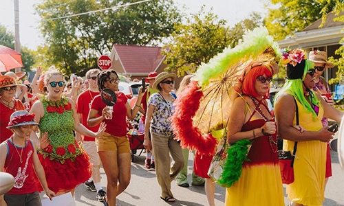 people at tomato art parade